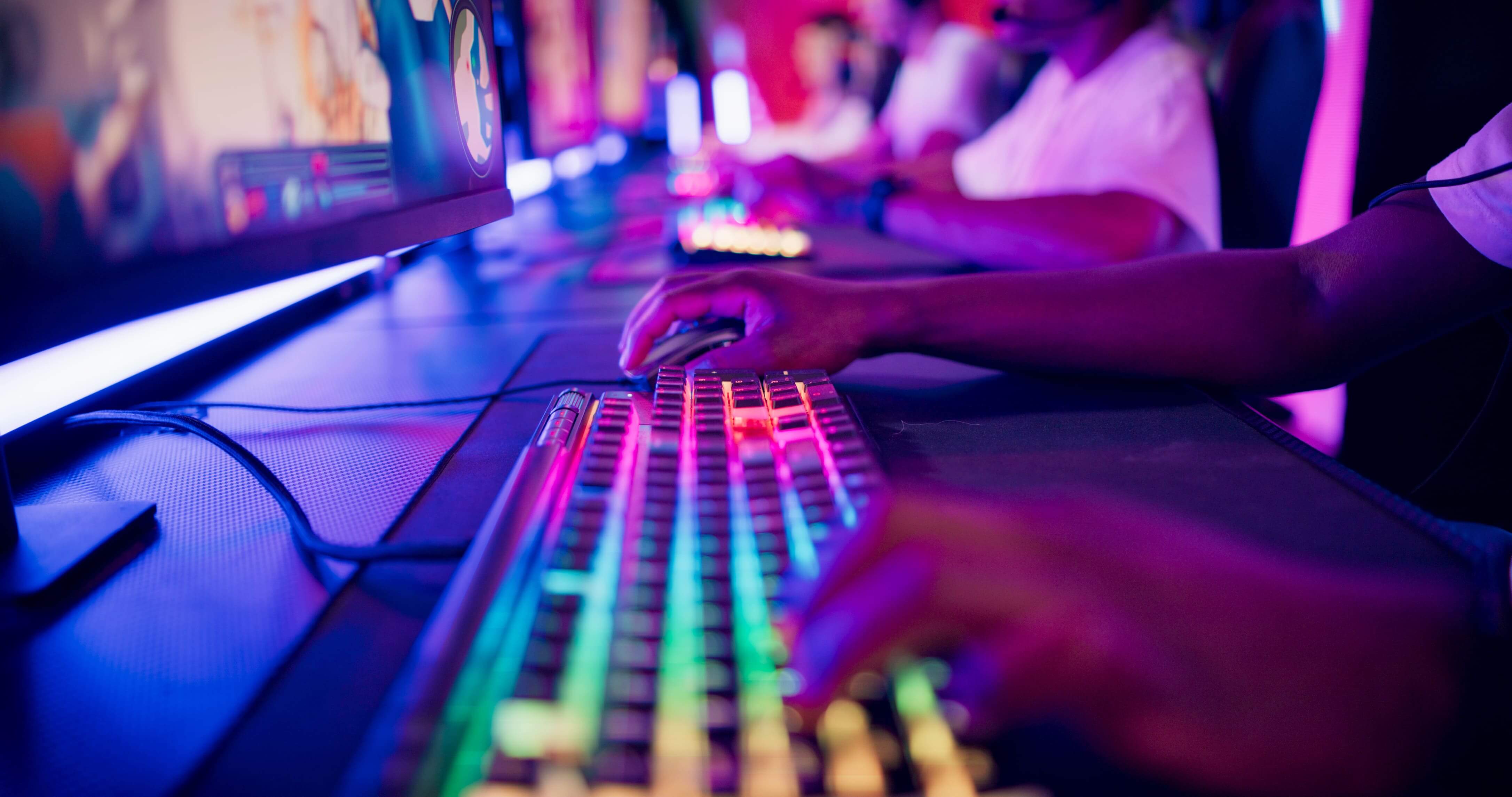 Close-up hand on a computer keyboard diverse pro gamer