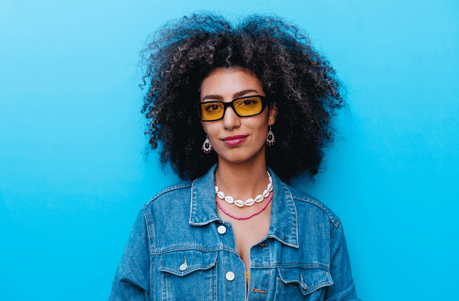 Stylish Middle Eastern woman with curly hair