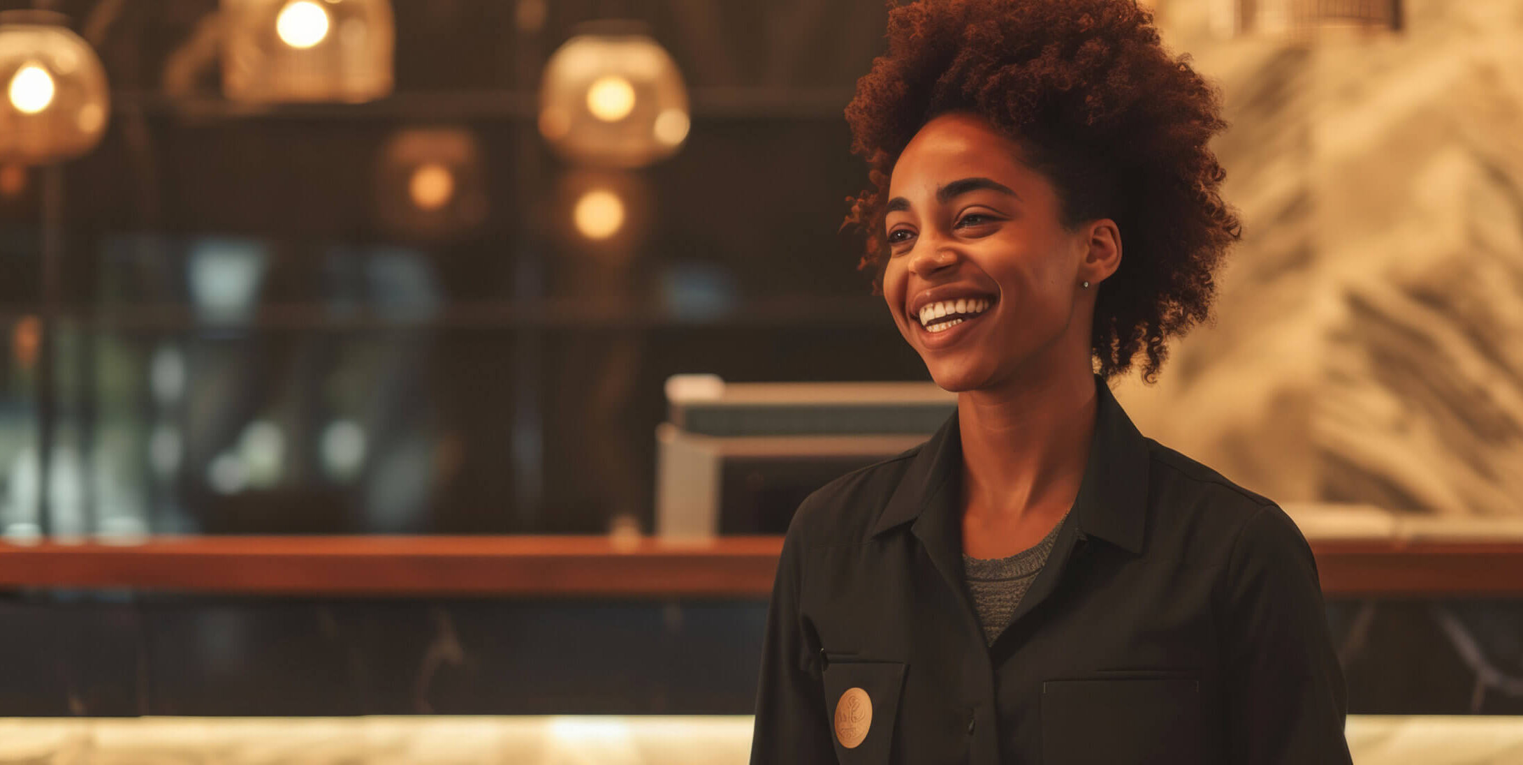 Hotel hostess greets guests with a radiant smile