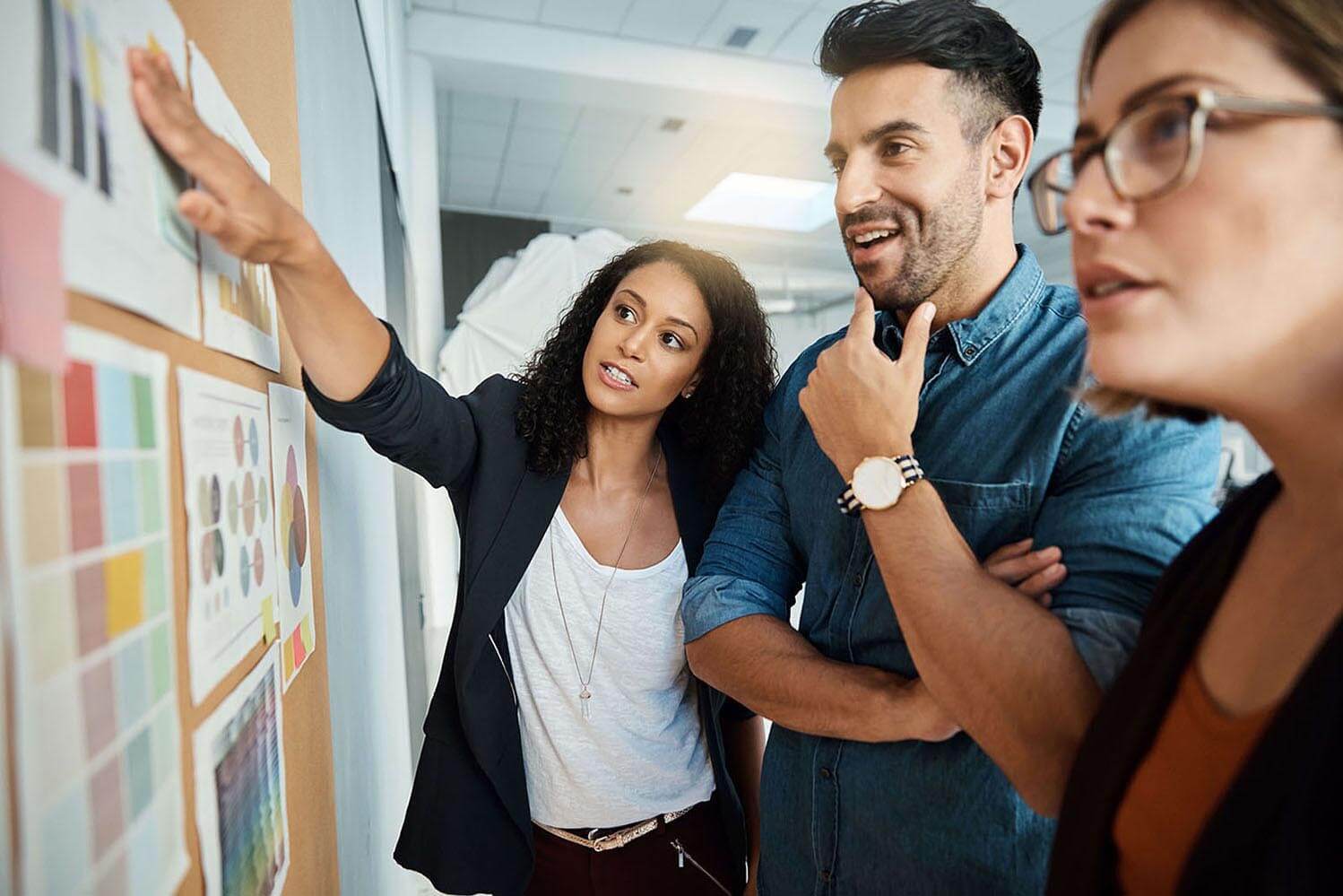 group of colleagues having a brainstorming session in a modern office