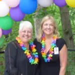 Two people attending the pride event.