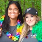 Two people attending the pride event.