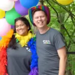 Two people attending the pride event.